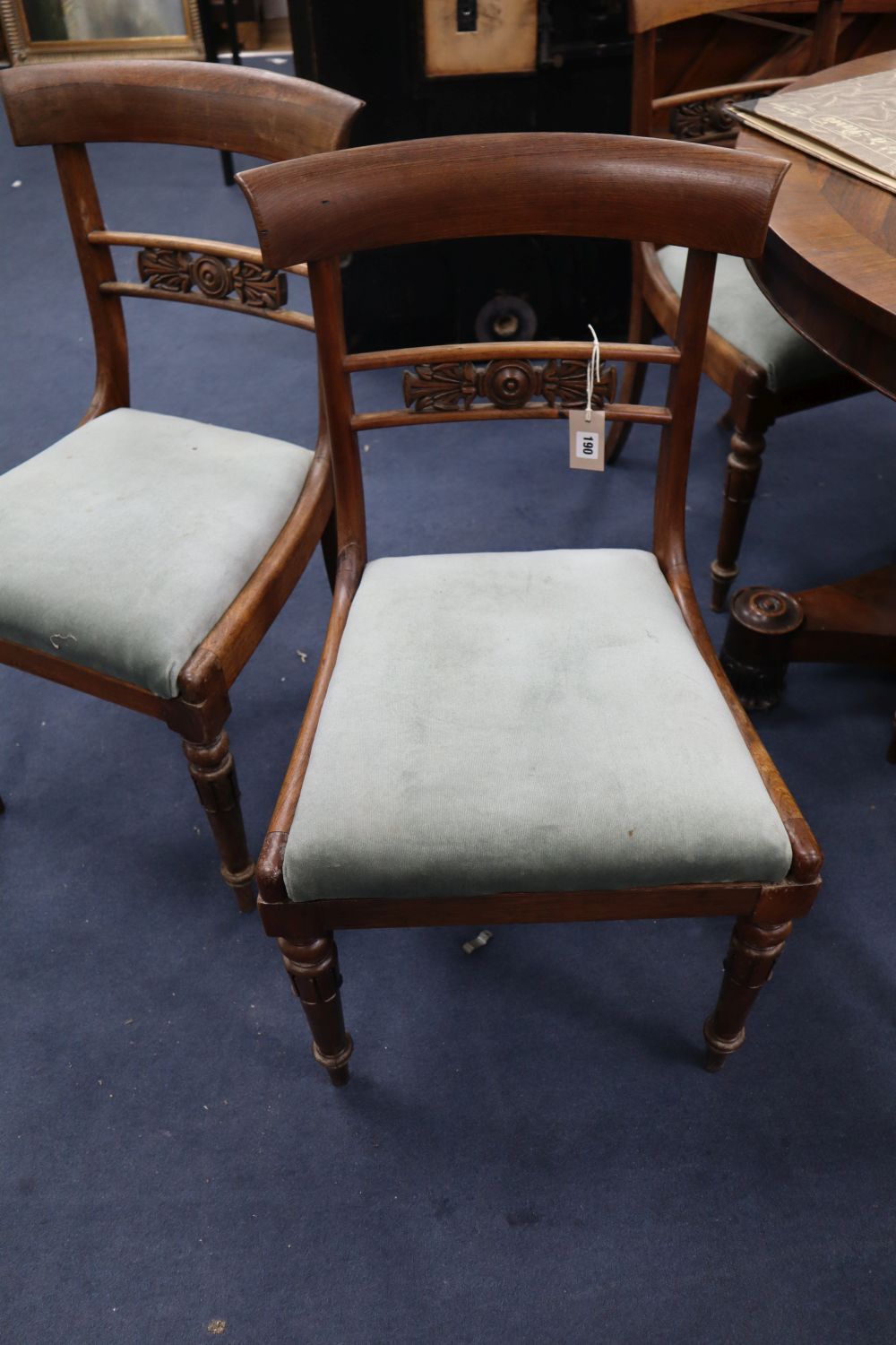 A set of eight William IV rosewood dining chairs